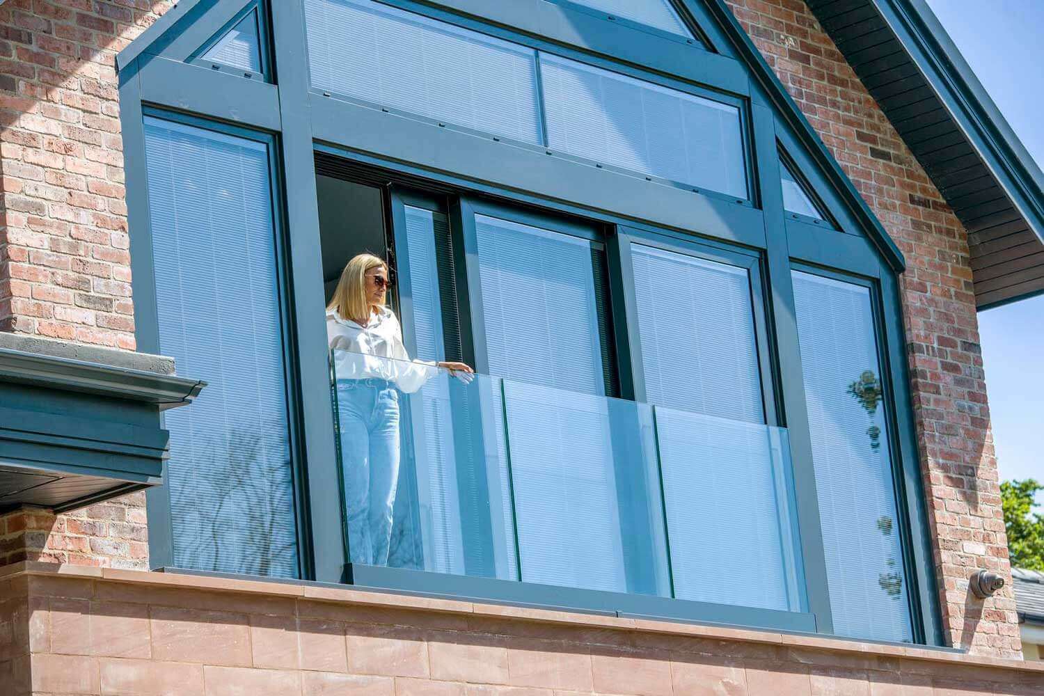 Blinds in Glass in Hatfield: integral blinds in apex gable glazing above a balcony