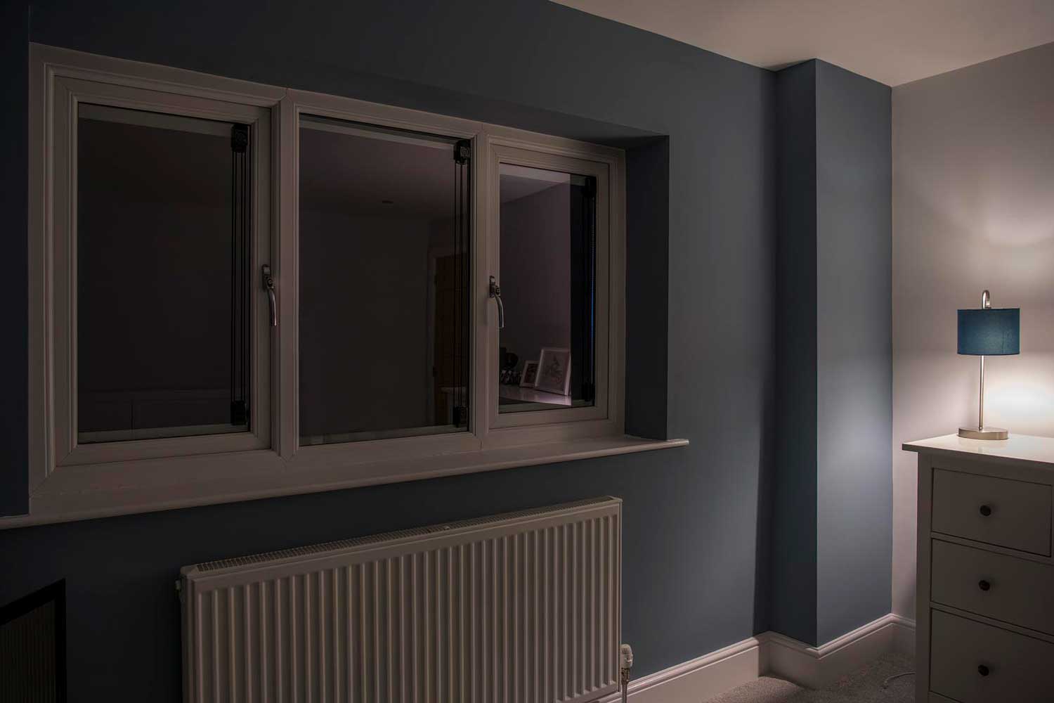 Blinds in Glass in Hatfield: blackout integral blinds fully closed in a bedroom