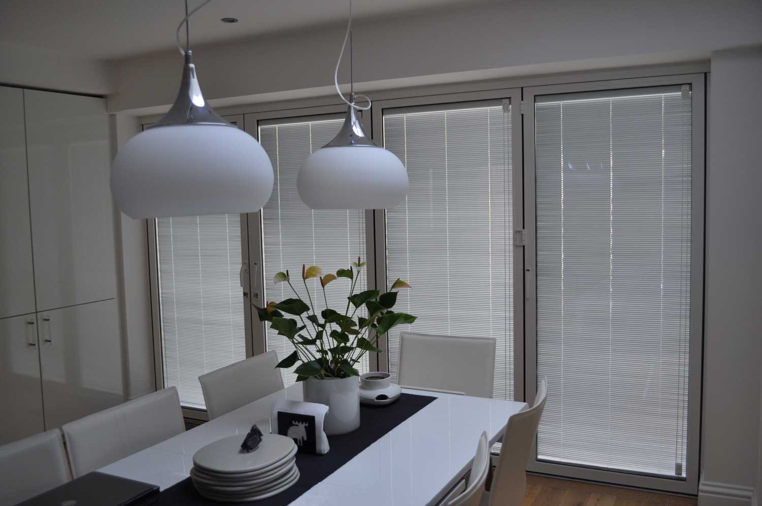 Blinds in Glass in Hatfield: white integral blinds in dining-room French doors