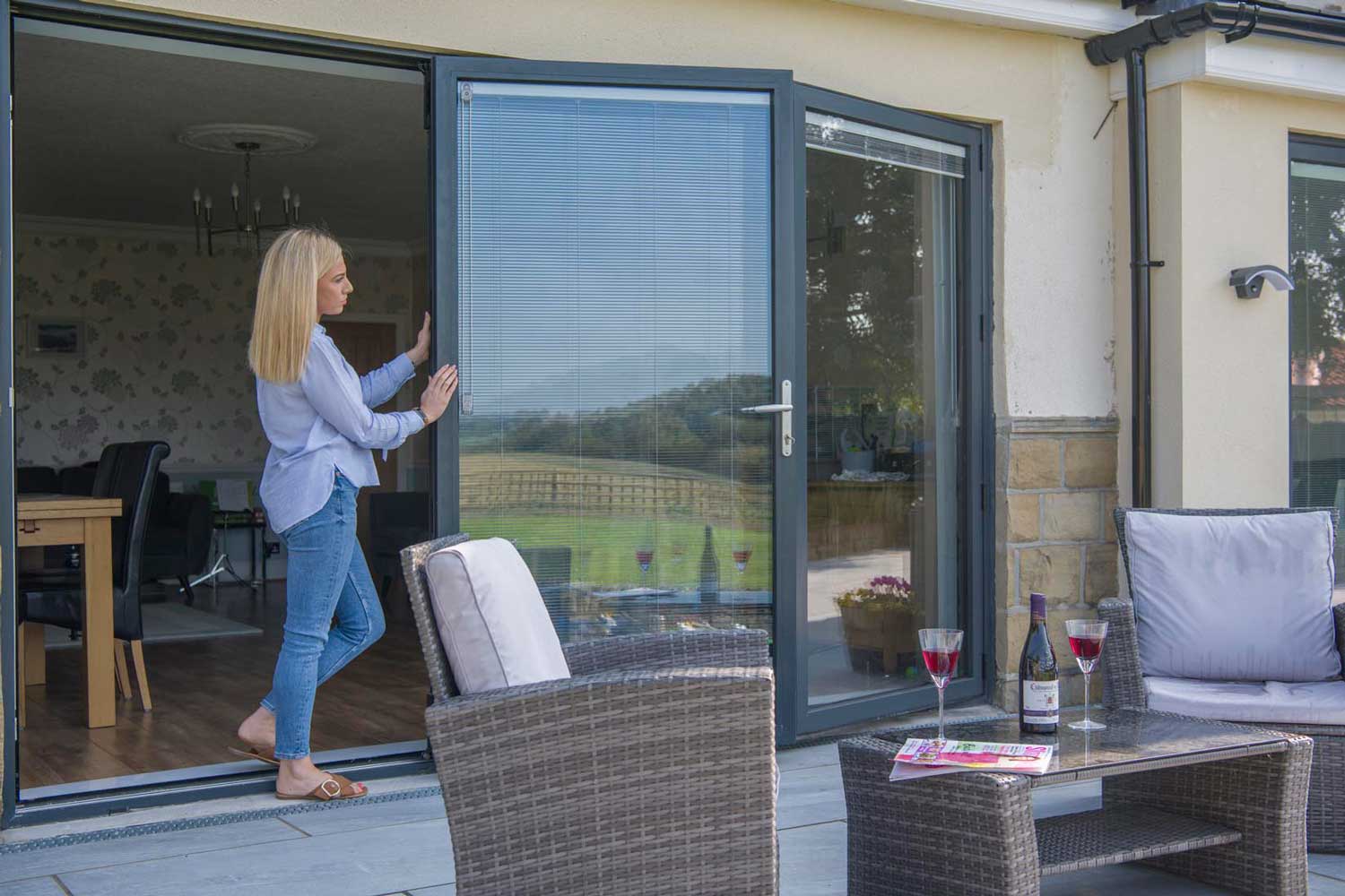 Blinds in Glass in Hatfield: integral blinds in bifold doors onto a patio